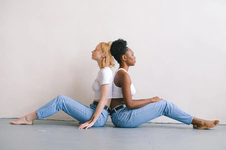 Two women sat back to back