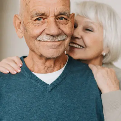 Old couple smiling