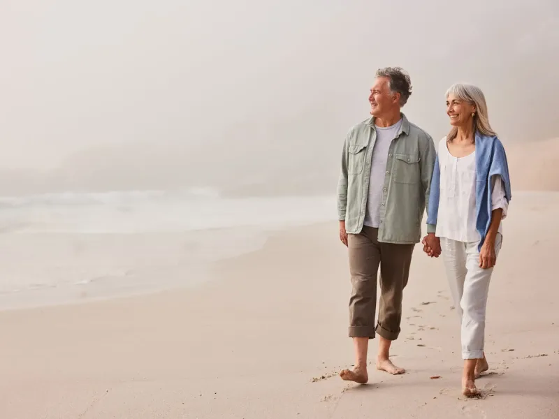 Couple walking on the beach